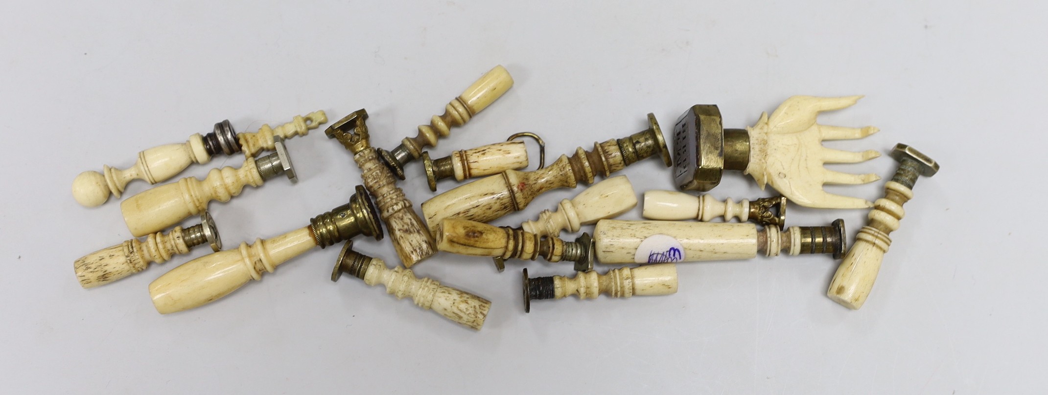 A group of approximately seventeen bone handled desk seals, 19th century and later